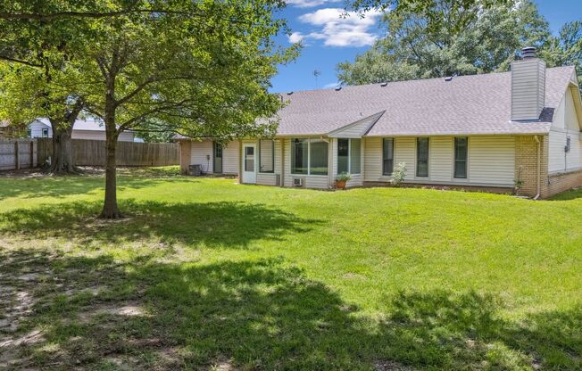 Spacious Single Story 4 Room Home + Sunroom on Nearly 1/2 Acre Lot!