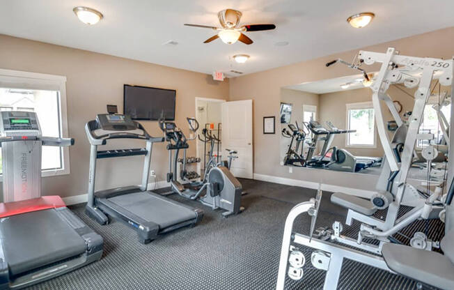 fitness center at The Hill's Apartments