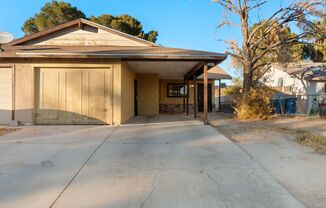 2 bedroom Townhome with Large Backyard and Storage Shed!