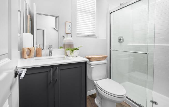 a bathroom with a toilet sink and shower at Solstice at Fiddyment Ranch, California, 95747