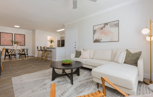 a living room with a couch and a table