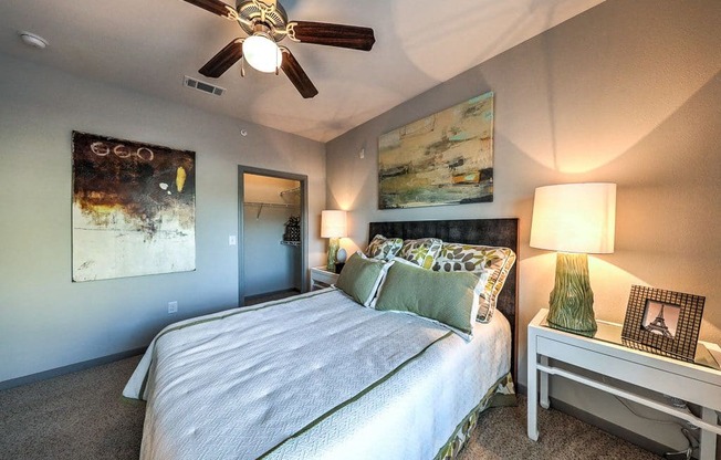 a bedroom with a bed and a ceiling fan at Waterstone at Cinco Ranch, Katy, TX, 77450