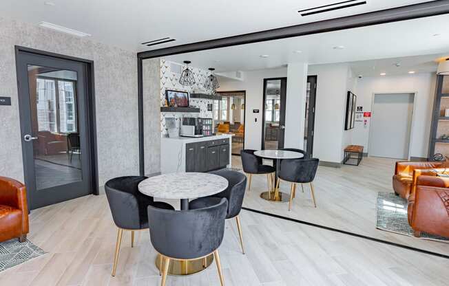 resident lounge with casual seating and drink station at Bayswater Apartments, Burlingame, CA