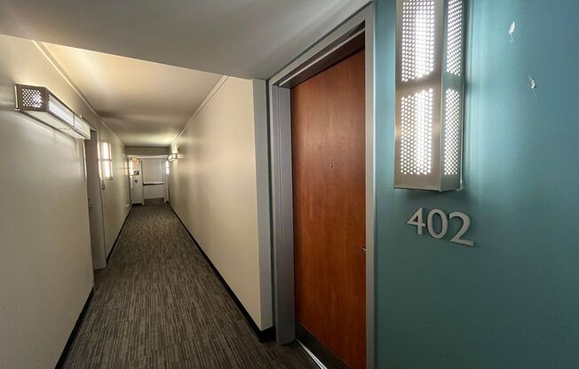 Modern Studio with Balcony, In-Unit Laundry, and Prime Lloyd District Location!
