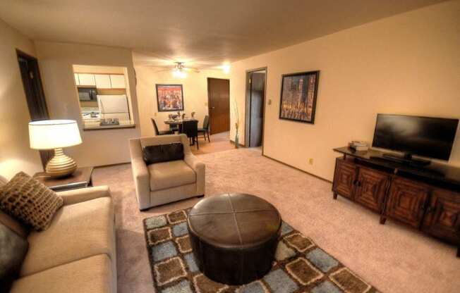 a living room with a couch and a tv