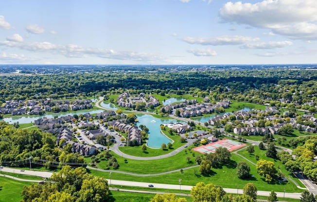 A view of a residential area with a river running through it.
