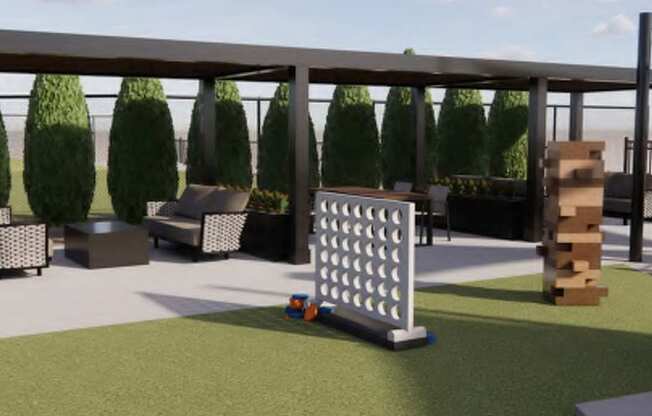 A white corn-themed game is in the middle of a grassy area.