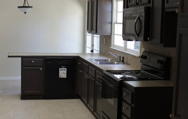Lovely 3 Bedroom Home with Large Fenced in Yard!