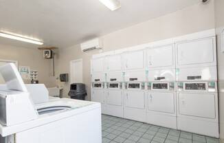 Laundry facility at Woodbridge Apartments Bloomington