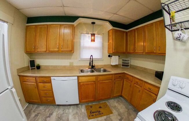 3D Tour Available - 2 BLOCKS TO CAMPUS or AGGIEVILLE + Two Sets of Washers & Dryers + Two Kitchens! Available August 1st!