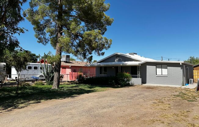 BEAUTIFULLY REMODELED 3 BEDROOM 1.5 BATHROOM HOME WITH A LARGE BACKYARD IN COOLIDGE