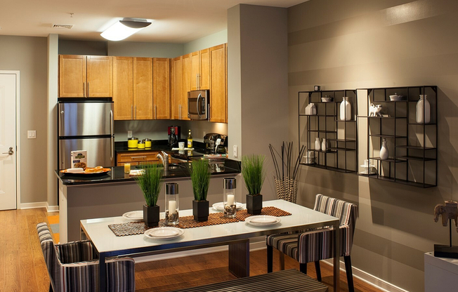 Dining Area & Contemporary Kitchen With Wood Cabinets & Stainless Steel Appliances