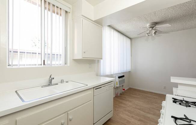 Kitchen with White Appliances and White Cabinets