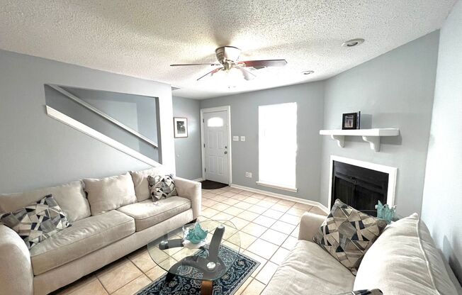 2 Bedroom Townhouse with a Fireplace and Reserved Parking
