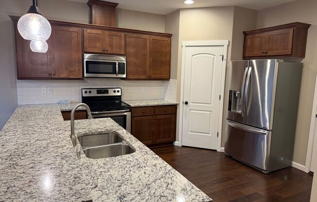 Beautiful 3 Bedroom House with High Ceilings, 2 Car Garage, Great Location & More!