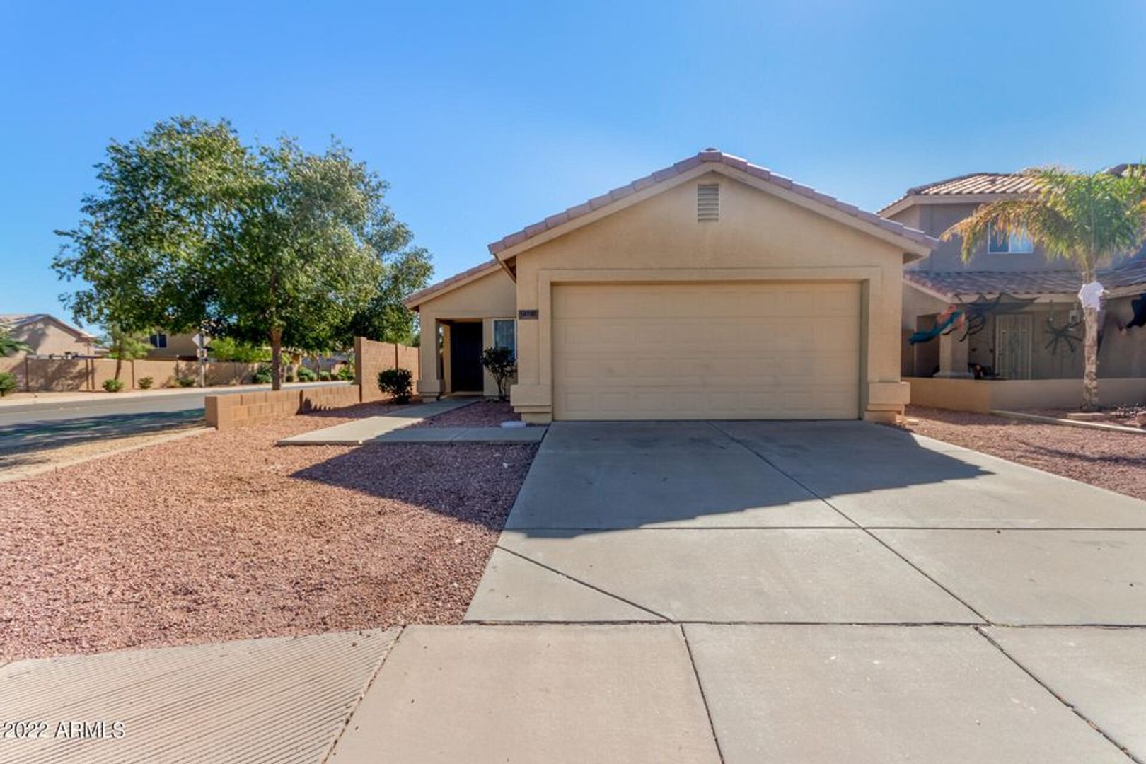 Spacious Corner Lot Home with a Private Backyard!