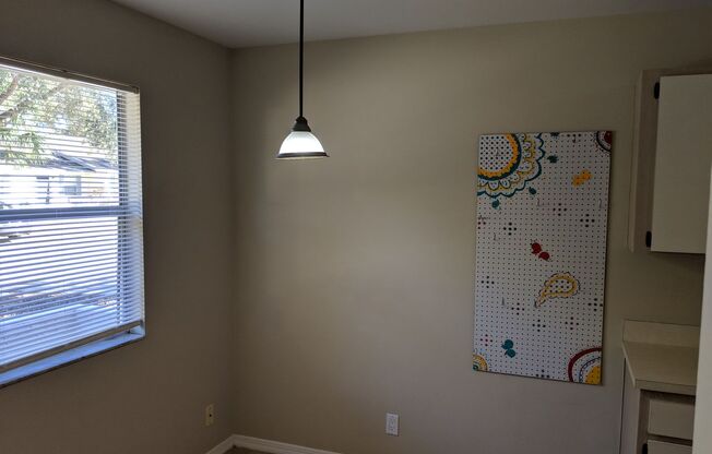 2/2 Flat with Assigned Parking, Screen Porch, Inside Laundry