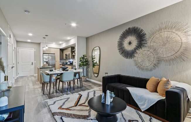 Living room and dining room with a kitchen in the background at Array La Mesa, La Mesa, 91942