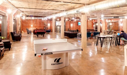 a ping pong table in the middle of a room