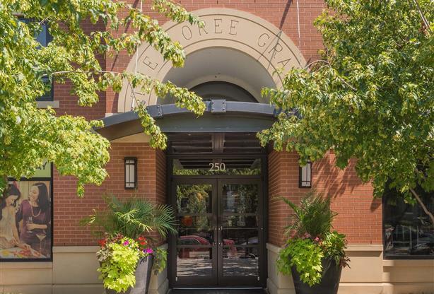 the front entrance of a building with a door