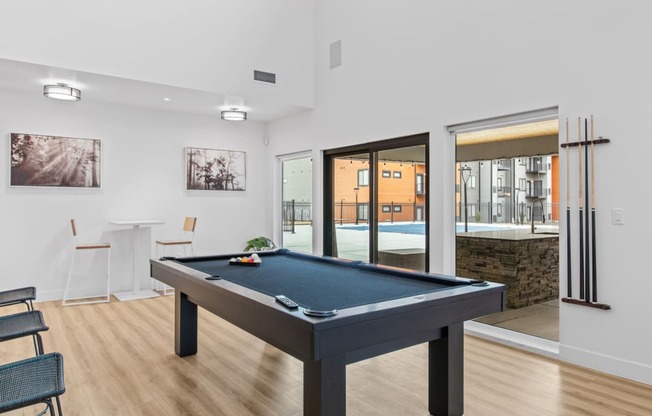a pool table at the bradley braddock road station apartments