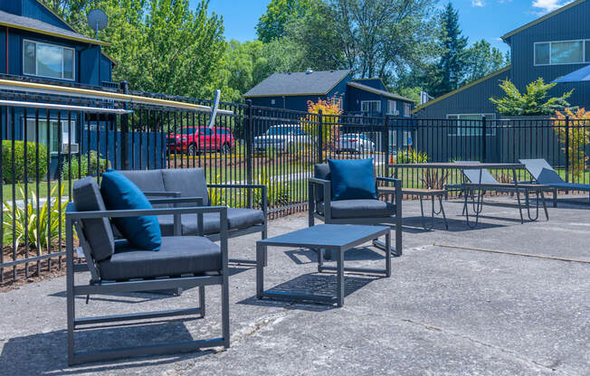 the patio at the whispering winds apartments in pearland, tx