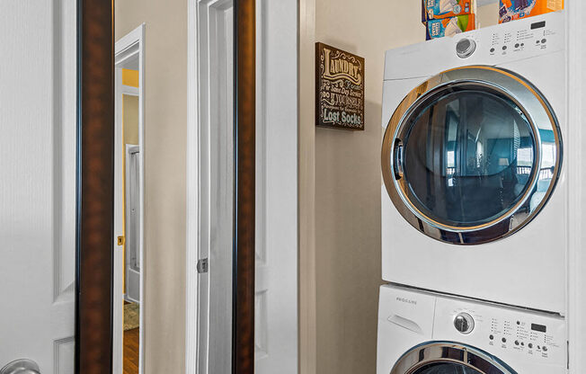 a washer and dryer in a laundry room with a door