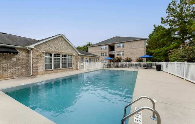 A swimming pool with a 5-foot depth marker.