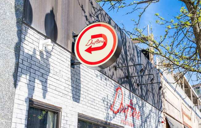 Drifters restuarant sign is on a building.