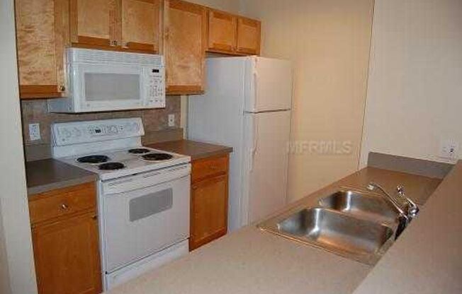 Spacious  and nice 2nd floor 2bed/1bath unit in the sought after Grand Key in South Tampa!