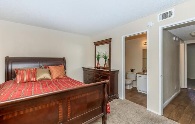a living room filled with furniture and a flat screen tv