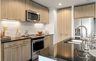 a kitchen with a sink and a counter top