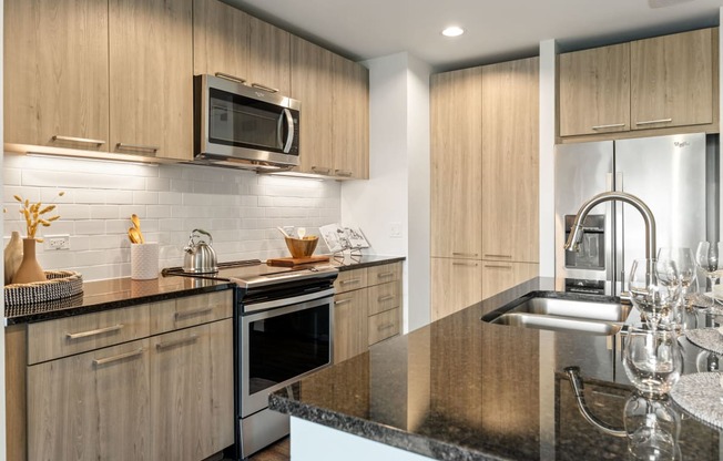 a kitchen with a sink and a counter top