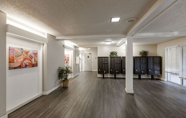 the lobby of a store with a wood floor