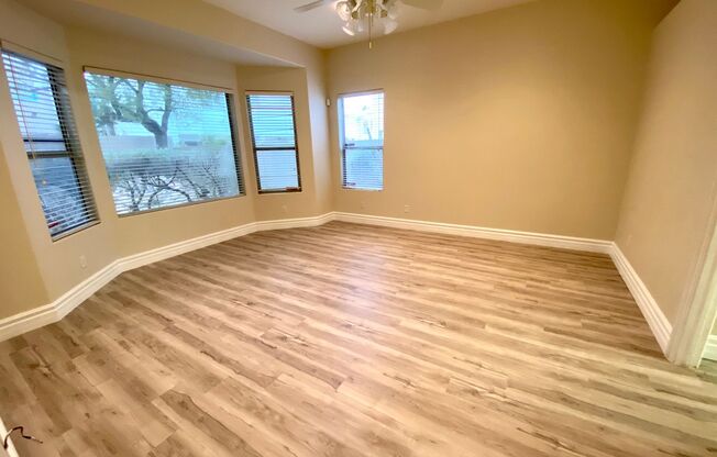 Single story home in guard gated Rhodes Ranch Community with an open kitchen in a great room, a large backyard with a covered patio, and all hard flooring throughout(tile & LVP). Community amenities available to tenants such as the club house, gym, basket