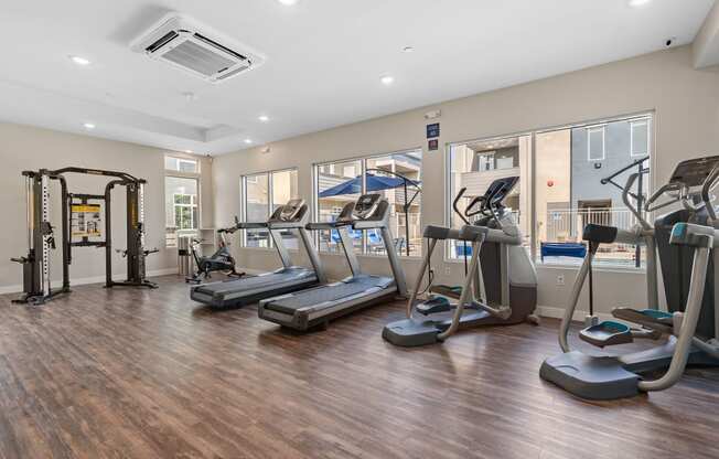 gym with cardio equipment at the enclave at woodbridge apartments in sugar land, tx at Loma Villas Apartments, San Bernardino, 92408