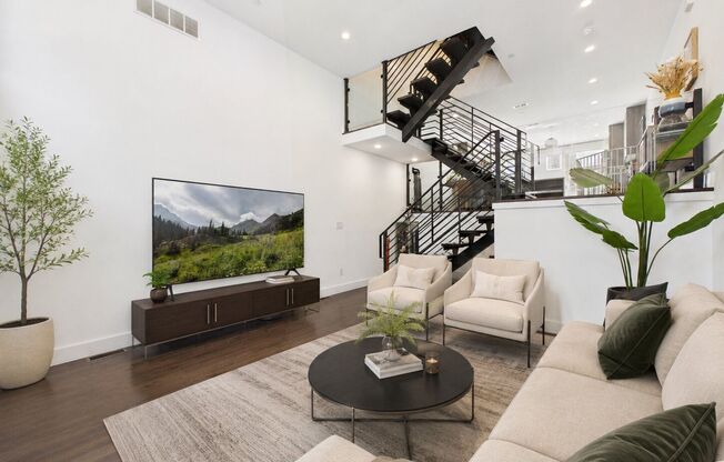 Rare 2-Car Gated Parking, Garage, Private Deck & Roof Deck with Skyline Views