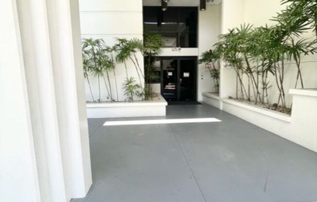 Rarely available corner end 2 bed 2 bath unit with 2 assigned parking stalls on high floor