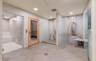 a room with a sink and a mirror