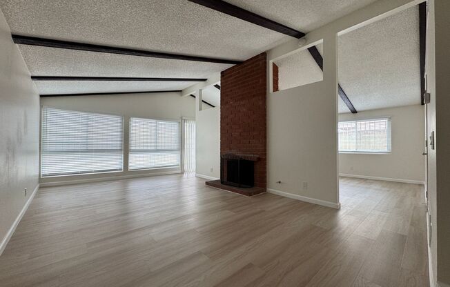 Adorable house in awesome Carson location w/beamed ceilings, fireplace, large yard, central A/C & 2-car garage