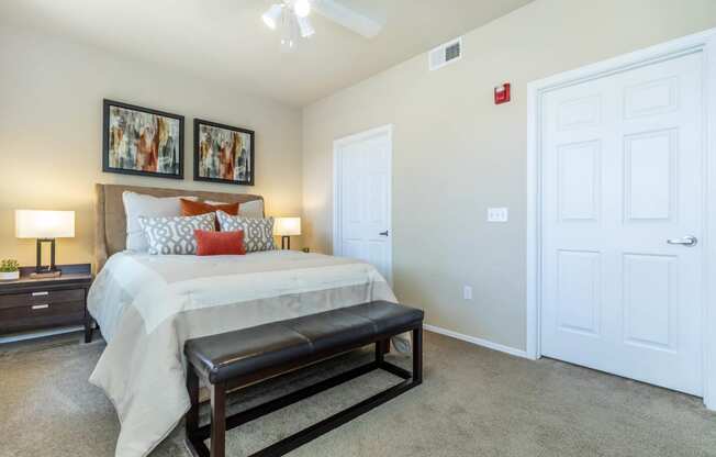 Bedroom with lamps at The Paseo by Picerne, Goodyear, Arizona