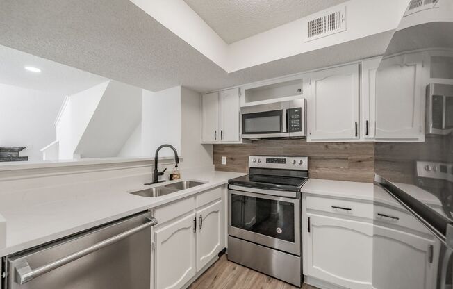 Updated 1-Bedroom Condo in Gated Community – Prime West 7th Location