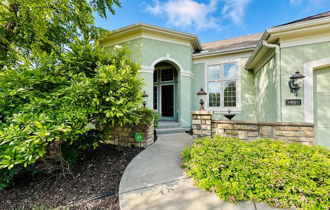 {9003} Wilshire Farms Reverse 1.5 Story Home + Walkout Basement + Three Car Garage + Fenced Yard