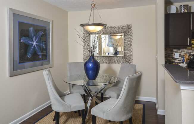 Dining roomat Harvard Place Apartment Homes by ICER, Lithonia, Georgia