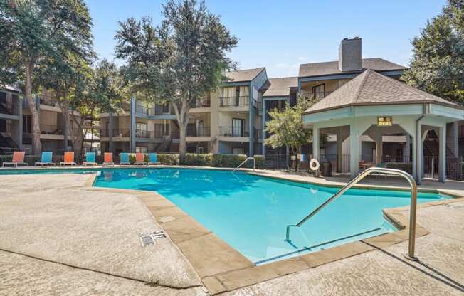 Crystal-clear pool at Laurels of Sendera apartments in Arlington, TX