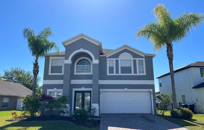 Beautiful 4 Bedroom 3 Bathroom Lake View Home in Gated Community of Timber Isle