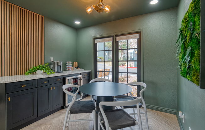 Hospitality bar and table inside leasing office at Treehouse in Albuquerque, New Mexico