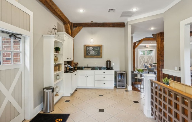 the kitchen is open to the dining room and living room