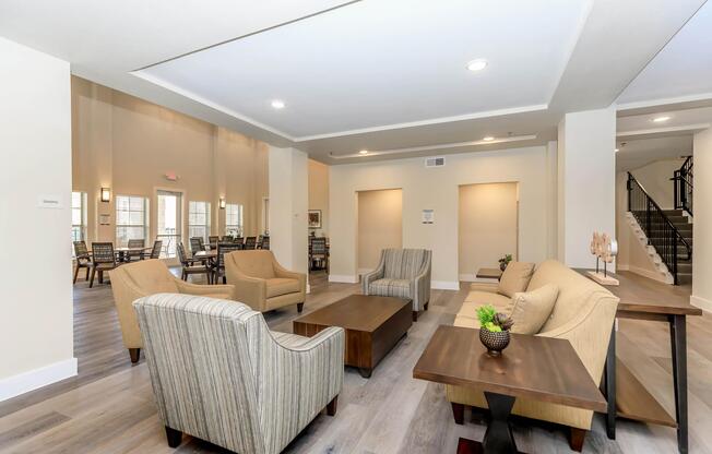 a living room filled with furniture and a table