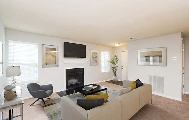 the preserve at ballantyne commons living room with couch and fireplace
